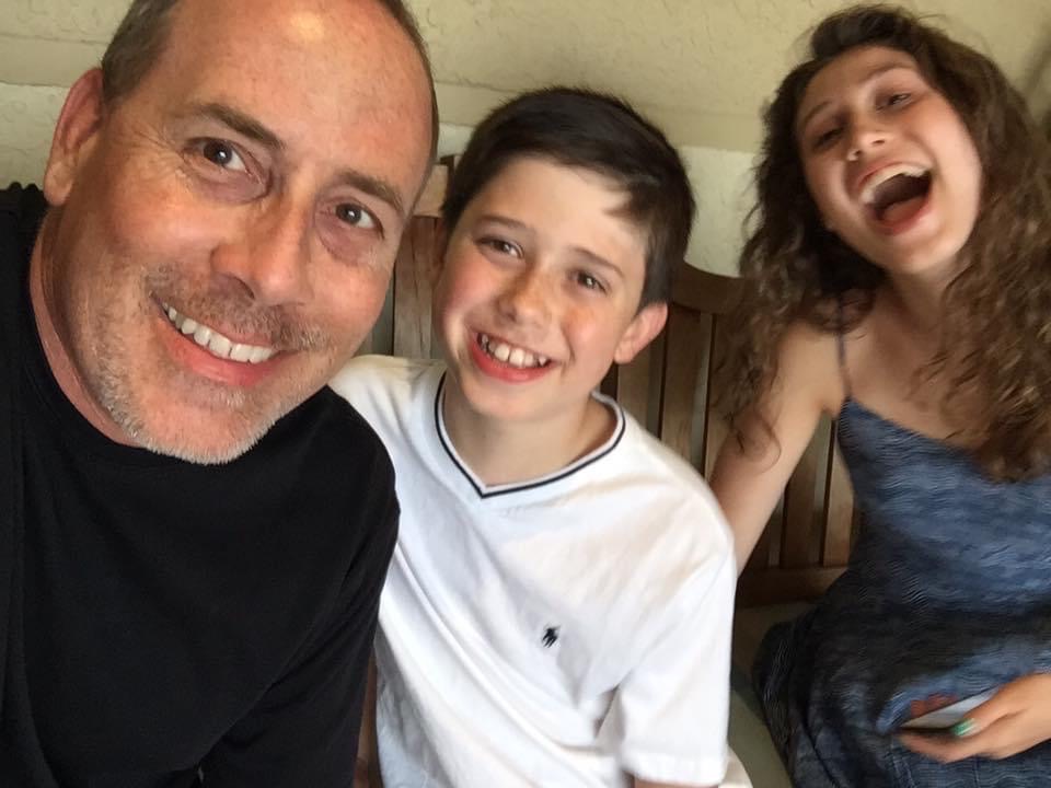 Father selfie with son and daughter