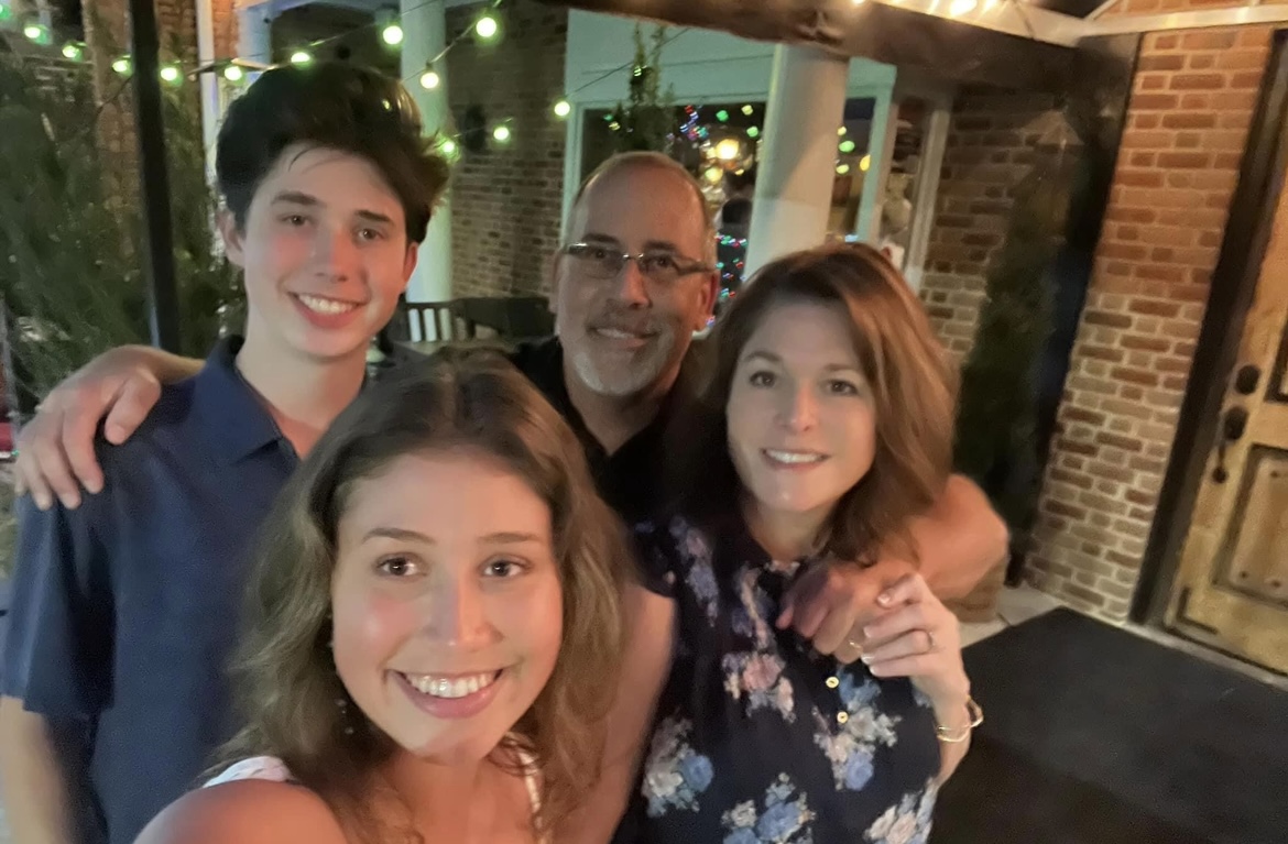 Father with wife and grown kids